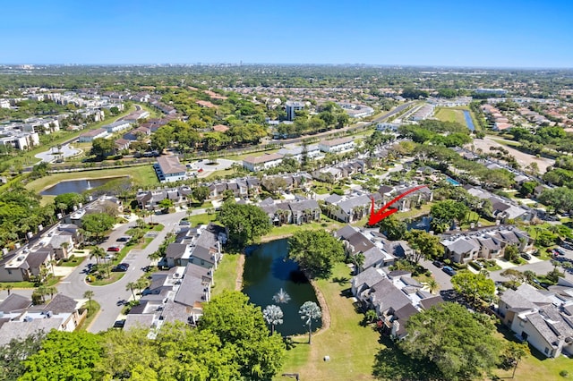 bird's eye view featuring a residential view and a water view