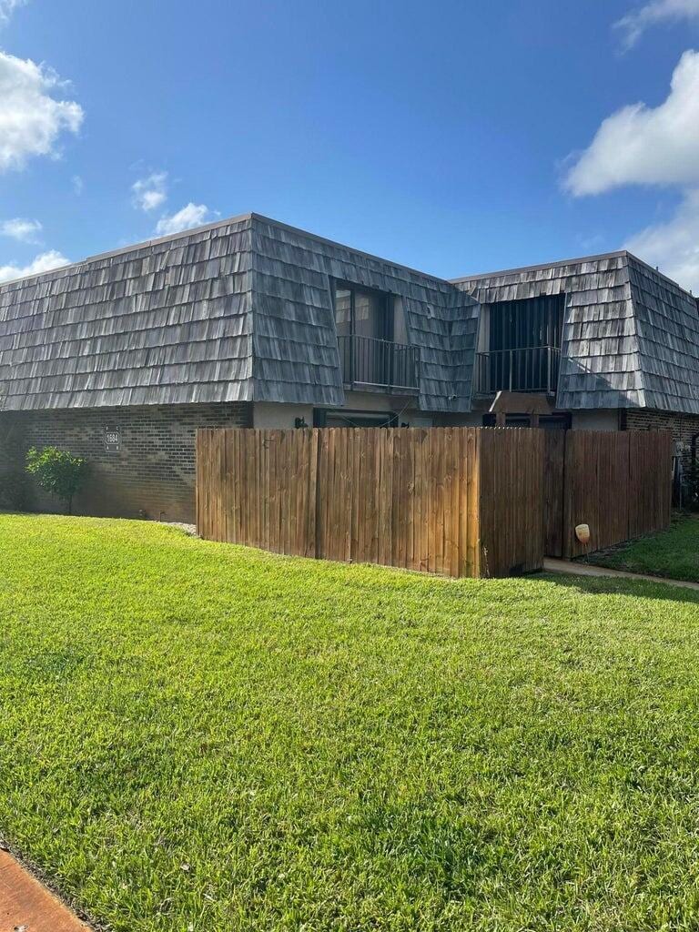 view of yard featuring fence