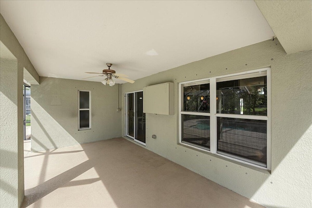 view of patio / terrace featuring ceiling fan