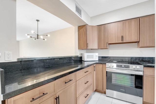 kitchen with white microwave, visible vents, stainless steel electric range, and light brown cabinetry