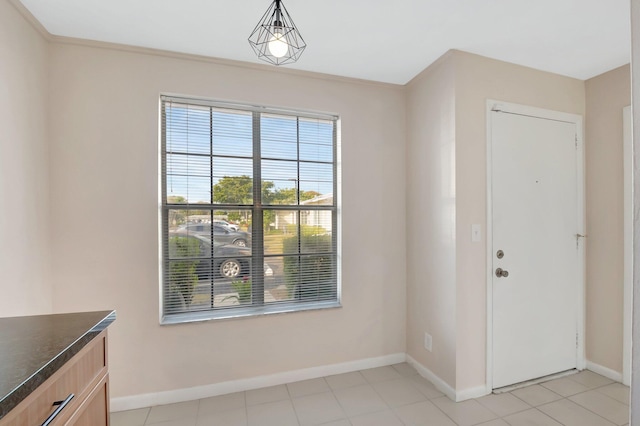 entrance foyer featuring baseboards