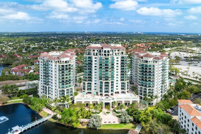 aerial view featuring a view of city and a water view