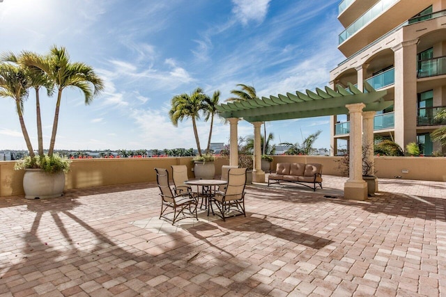 view of patio featuring a pergola