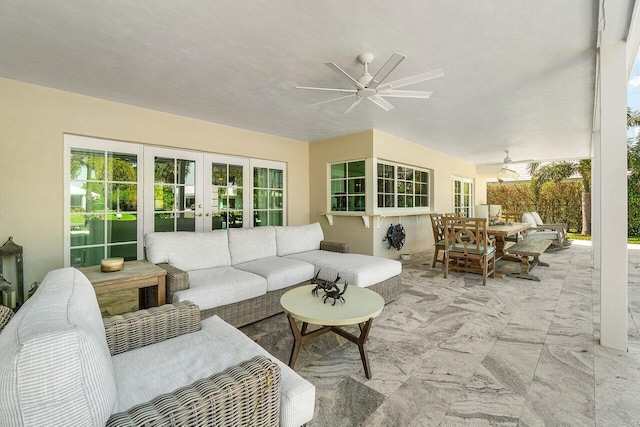 view of patio featuring outdoor lounge area, outdoor dining space, french doors, and a ceiling fan