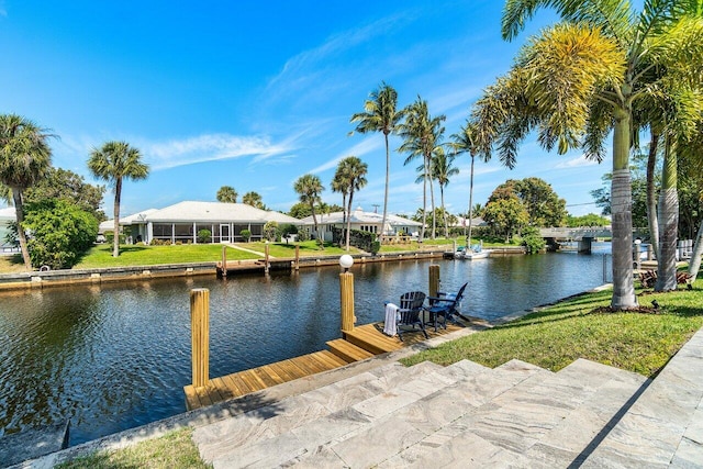 view of water feature with a dock