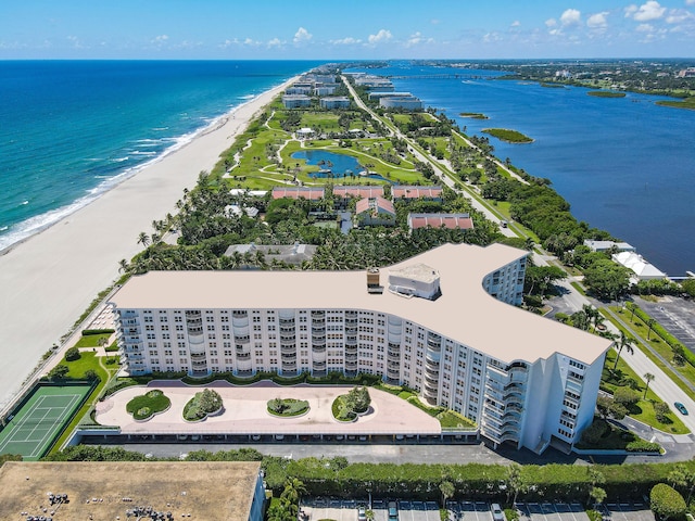 bird's eye view with a beach view and a water view