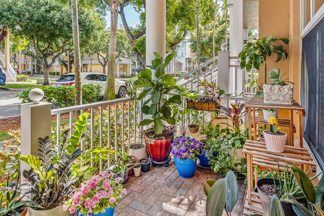 balcony featuring a residential view and covered porch