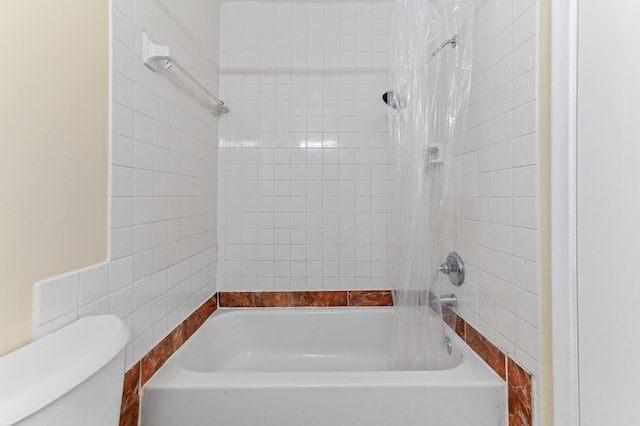 full bath featuring toilet and shower / tub combination