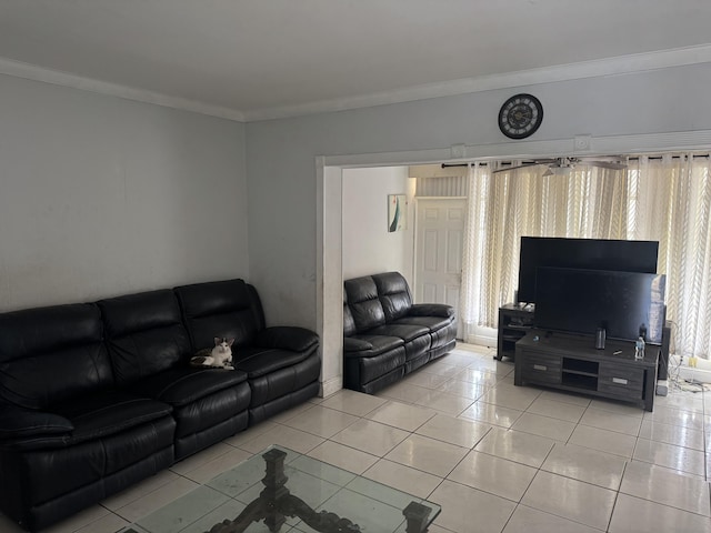 living room featuring ornamental molding and light tile patterned floors