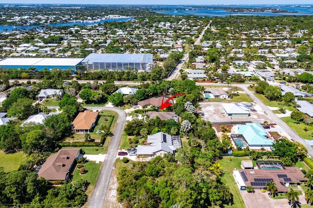 aerial view with a residential view and a water view