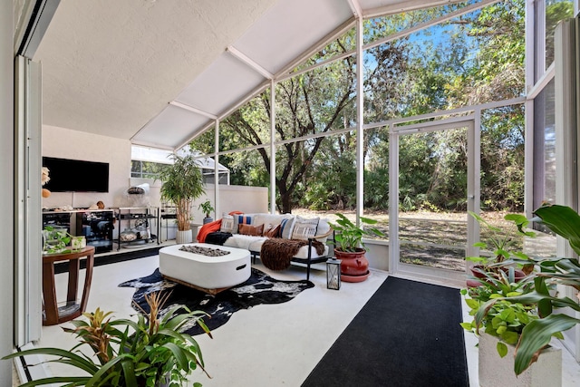 sunroom with lofted ceiling