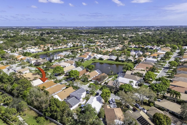 aerial view featuring a residential view and a water view