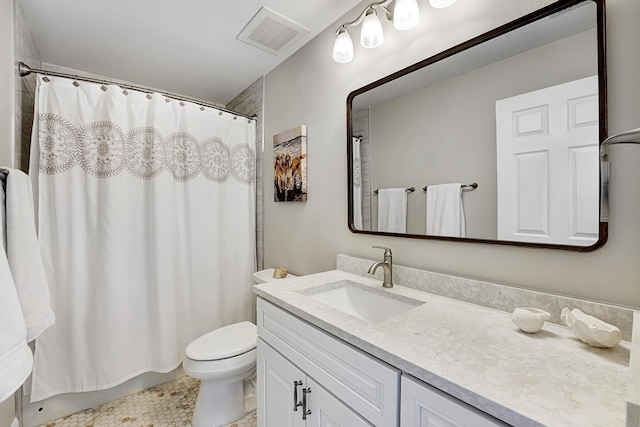 full bath with toilet, visible vents, and vanity