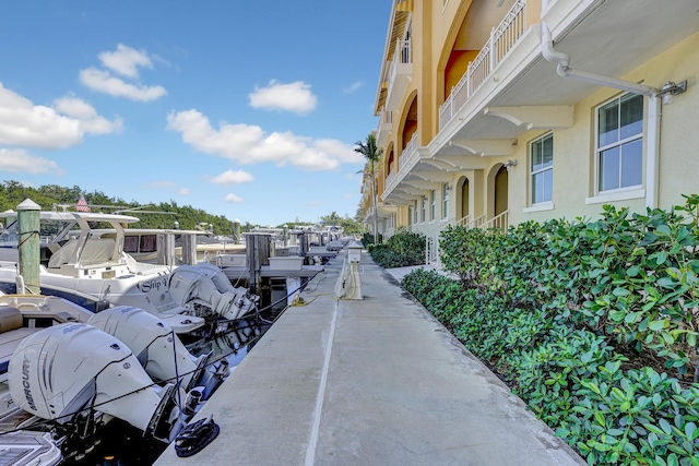 surrounding community with a boat dock