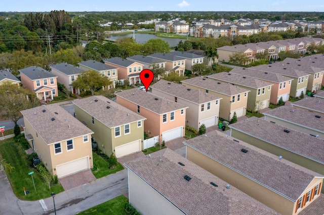 2349 SE Union Park Dr, Port Saint Lucie, FL 34952 - drone / aerial view with a water view and a residential view