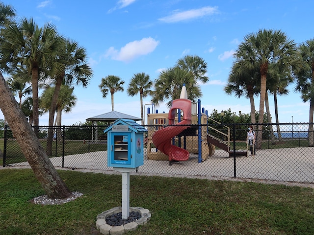2349 SE Union Park Dr, Port Saint Lucie, FL 34952 - community playground featuring fence and a lawn