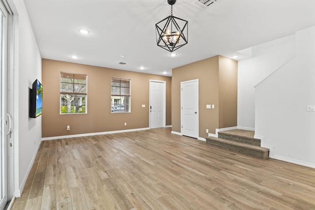 2349 SE Union Park Dr, Port Saint Lucie, FL 34952 - interior space with light wood finished floors, stairway, and recessed lighting