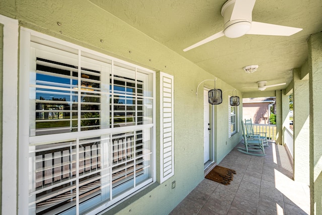 view of patio with ceiling fan