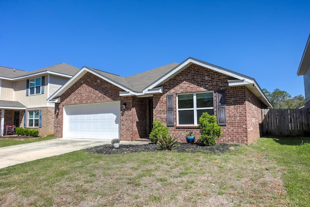 view of front of home with concrete driveway, fence, an attached garage, a front lawn, and brick siding