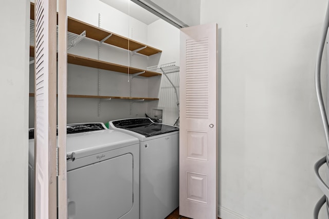 laundry area featuring laundry area and washing machine and clothes dryer