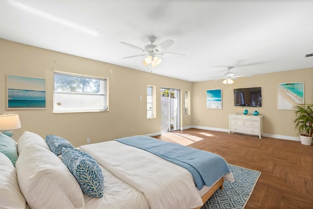 bedroom with access to exterior, visible vents, baseboards, and ceiling fan