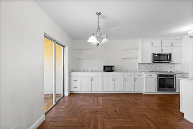 kitchen featuring open shelves, light countertops, white cabinets, appliances with stainless steel finishes, and tasteful backsplash