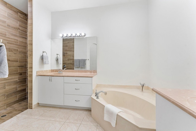 bathroom featuring a bath, walk in shower, and vanity