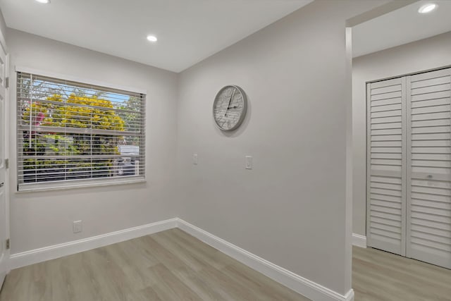 interior space featuring light wood finished floors, recessed lighting, and baseboards