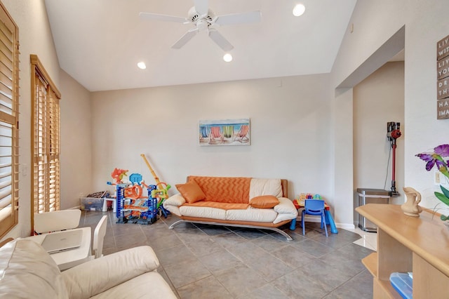 living room featuring ceiling fan, baseboards, tile patterned flooring, and recessed lighting
