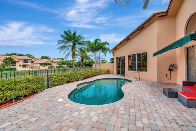 view of pool with a fenced in pool, a patio area, and a fenced backyard