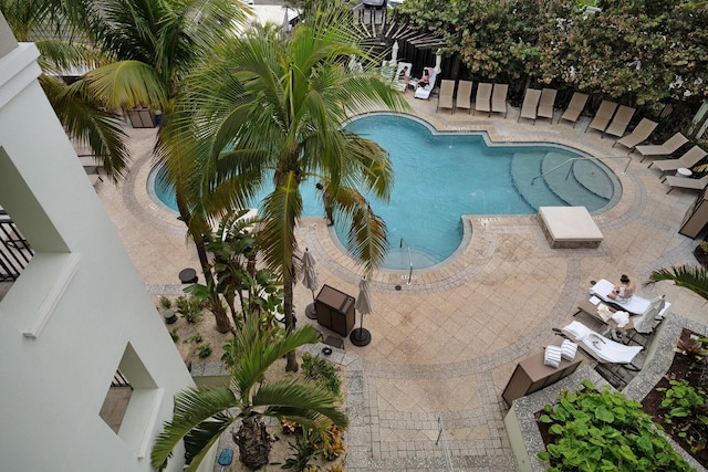 community pool with a patio