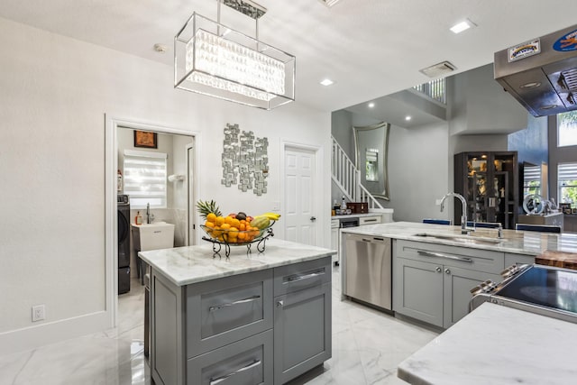 21741 Westmont Ct, Boca Raton, FL 33428 - kitchen with dishwasher, gray cabinets, light marble finish flooring, a center island, and light stone countertops