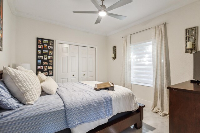 21741 Westmont Ct, Boca Raton, FL 33428 - bedroom featuring a closet, ornamental molding, and a ceiling fan