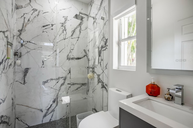 21741 Westmont Ct, Boca Raton, FL 33428 - bathroom featuring vanity, a marble finish shower, and plenty of natural light
