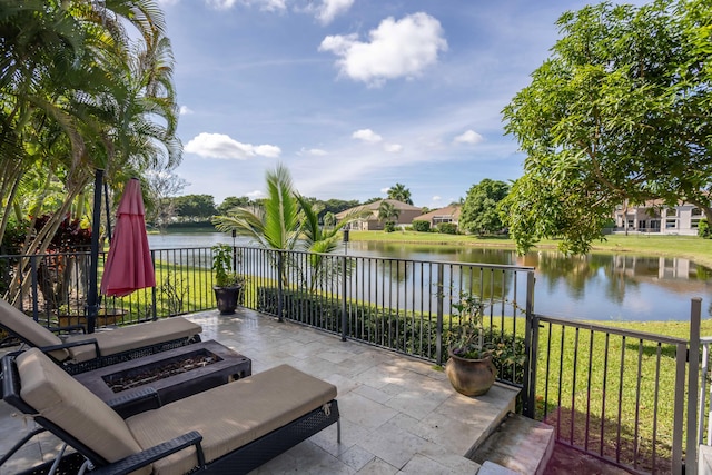 21741 Westmont Ct, Boca Raton, FL 33428 - view of patio featuring a fire pit and a water view
