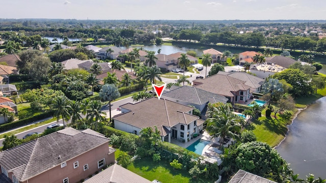 21741 Westmont Ct, Boca Raton, FL 33428 - aerial perspective of suburban area with a pool area and a large body of water