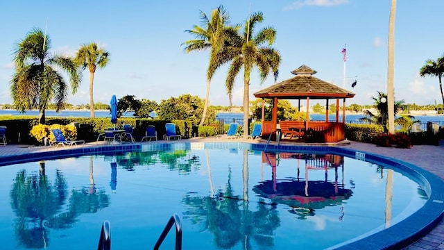 community pool featuring a gazebo