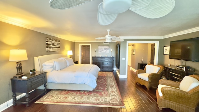 bedroom featuring baseboards, ornamental molding, and hardwood / wood-style floors