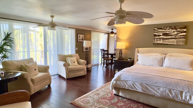 bedroom featuring ceiling fan, ornamental molding, and hardwood / wood-style floors