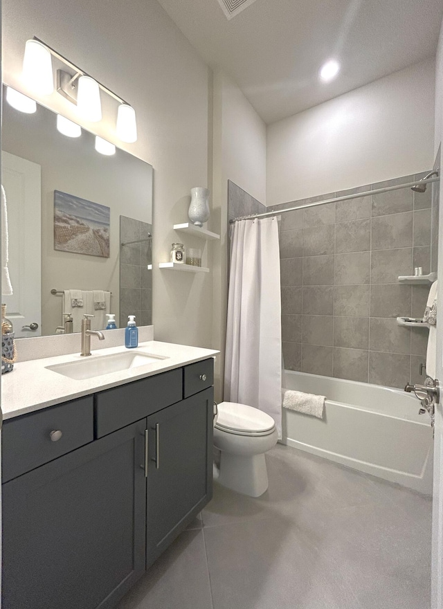 bathroom with shower / tub combo with curtain, visible vents, toilet, vanity, and tile patterned floors