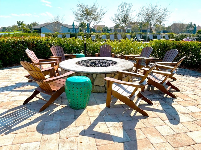 view of patio with an outdoor fire pit