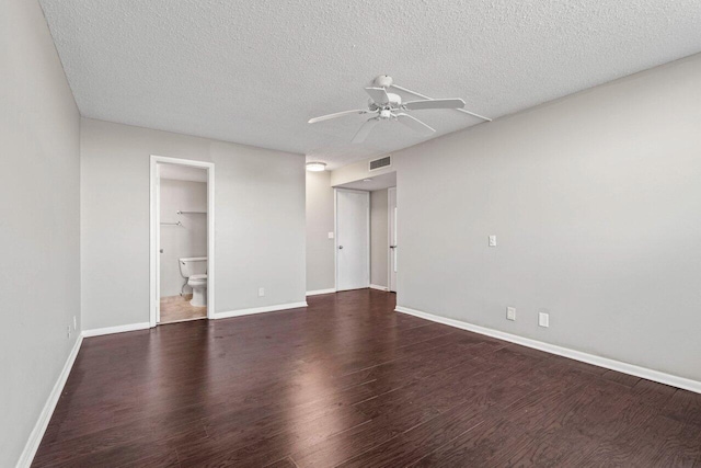 5700 NW 2nd Ave Unit 401, Boca Raton, FL 33487 - unfurnished bedroom featuring visible vents, a textured ceiling, baseboards, and wood finished floors