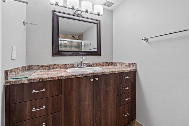 5700 NW 2nd Ave Unit 401, Boca Raton, FL 33487 - bathroom with visible vents and vanity