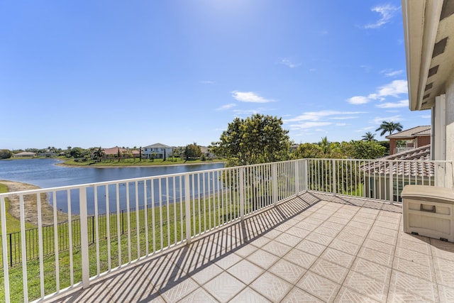 balcony featuring a water view