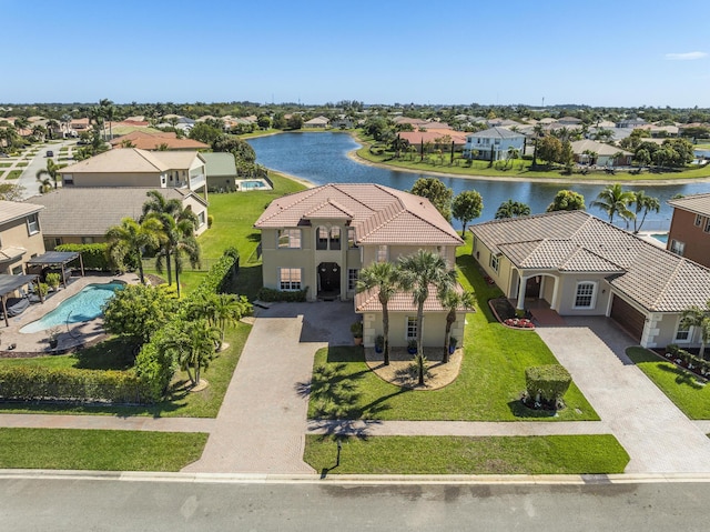 aerial view featuring a residential view and a water view