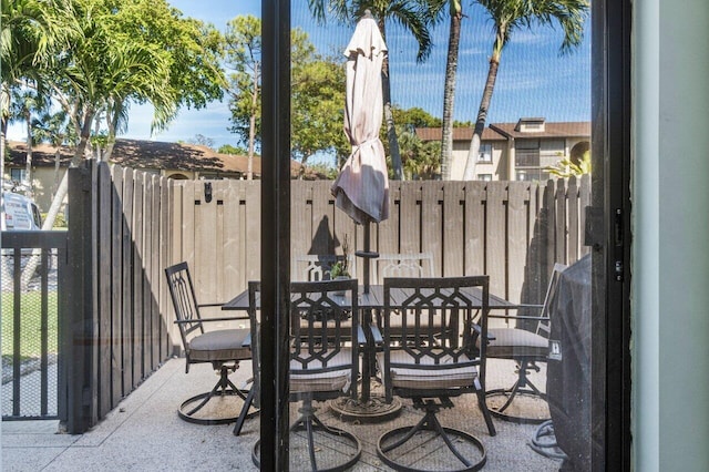 view of patio with fence