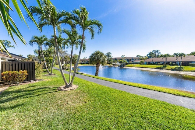 water view featuring fence and a residential view