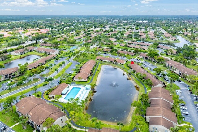 aerial view featuring a water view and a residential view