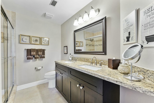 bathroom with tile patterned flooring, visible vents, a sink, and a shower stall