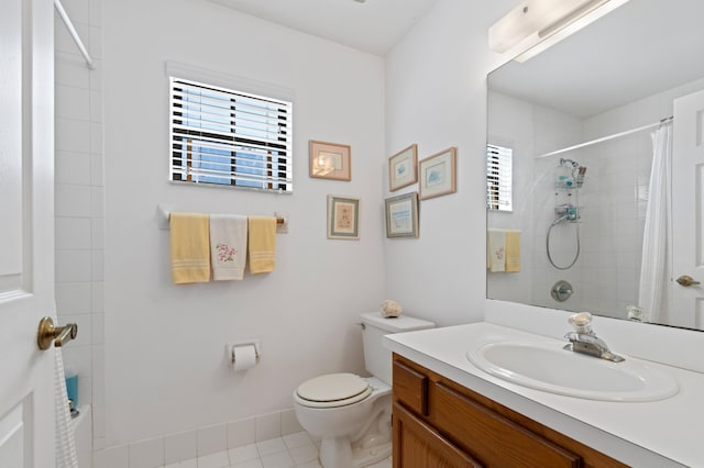 full bathroom featuring tile patterned flooring, vanity, and toilet